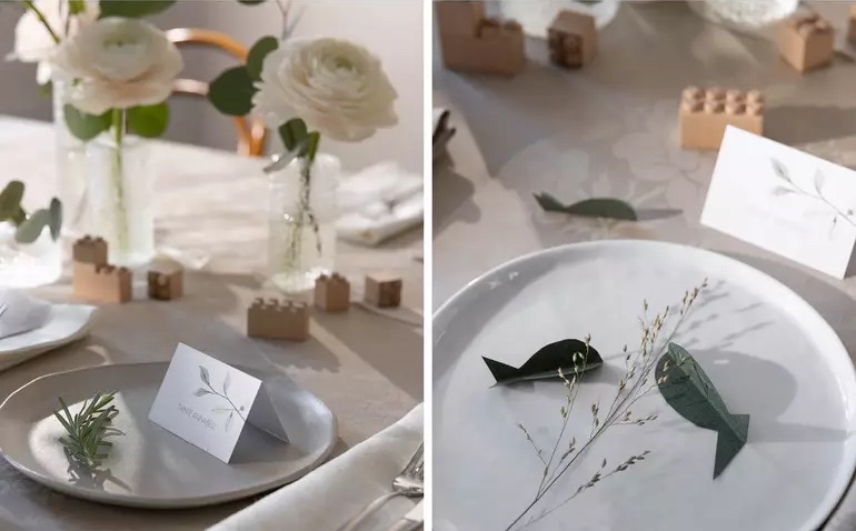 Poissons en papier comme élément de décoration de la table de fête de baptême